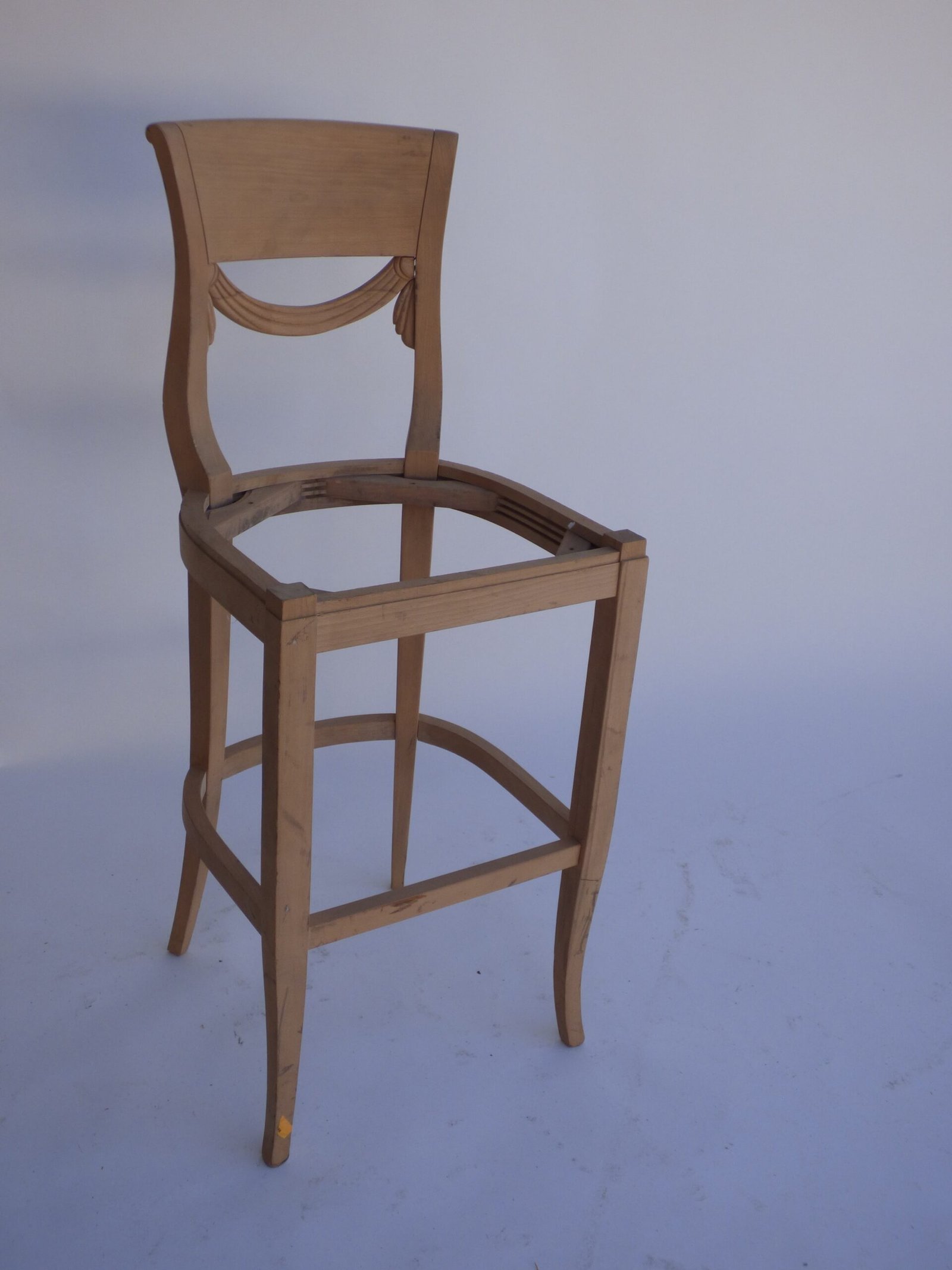 UNF-SP-67 Bar Stool 1 in stock in Beech( without the carving on the back) $ 25